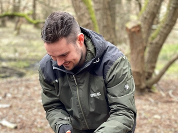 Elliot doing bushcraft activity