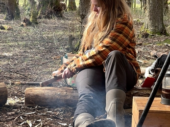 Sarah doing bushcraft activities 