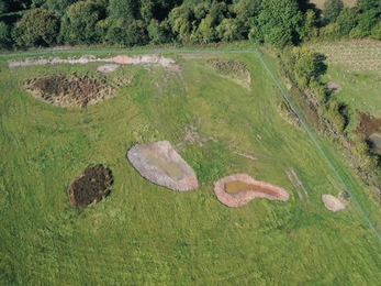 Landscape aerial view after pond construction