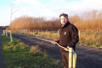 Erin McDaid inspecting the tree damage at Idle Valley Nature Reserve 2018