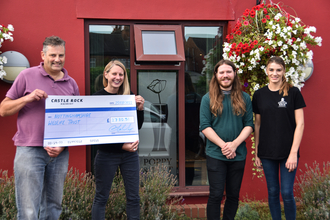 Colin Wilde, Managing Director Castle Rock Brewery presenting the cheque to Emily Patrick, Business Partnerships Officer, Nottinghamshire Wildlife Trust