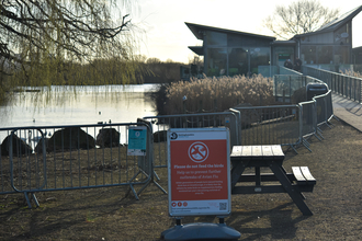 Avian flu sign to advise not to feed the birds at Attenborough Nature Reserve