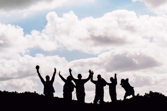 Silhouetted group of people