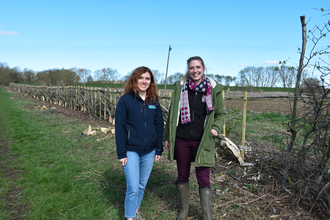 Left to right Bryony Harrison of Severn Trent with Lisa Channing Nottinghamshire Wildlife Trust alongside hedge laying at landowners Pollybell in North Nottinghamshire.