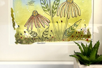 Mixed-media embroidered picture in frame with plants in front