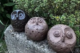 Terracotta owl sculptures