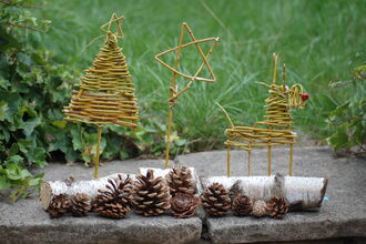 Willow decorations of a Christmas tree, a star and a reindeer