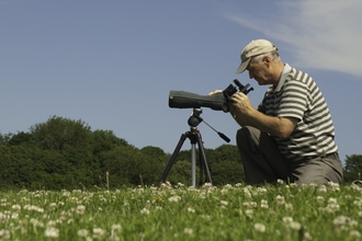 Man with scope (by Rob Jordan/2020VISION)