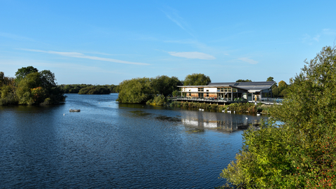 A view of Attenborough Nature Centre and Coneries Pond