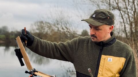 Martin Wright working on a painting outdoors