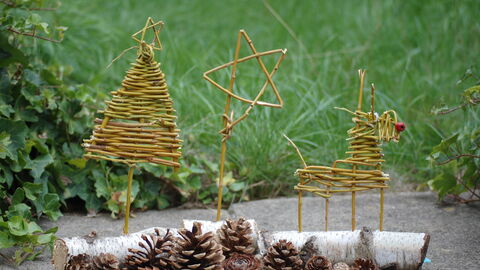 Willow decorations of a Christmas tree, a star and a reindeer