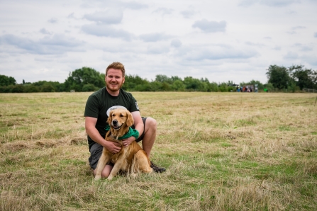 Youth Worker, Jamie Shortland with his therapy dog Luna.