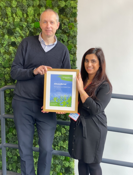 Ian Stendhurst  Director, Portfolio Management and Business Process Improvement, Albumedix with Sienna Carver, Nottinghamshire Wildlife Trust presenting the certificate