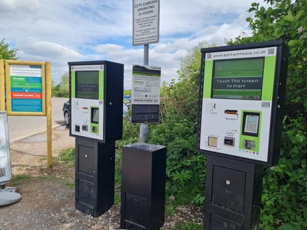 The car park machines and signs at Attenborough Nature Reserve