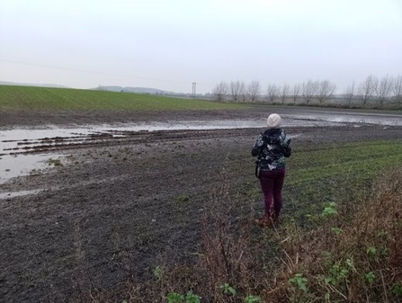 Lena inspecting the Bevercotes Beck floodplain for the 3 Rivers project