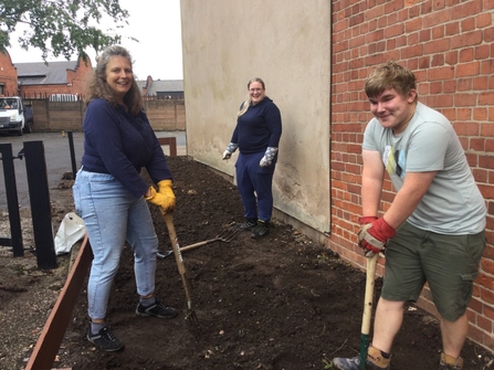Members of Basford Road Baptist Church working on community garden