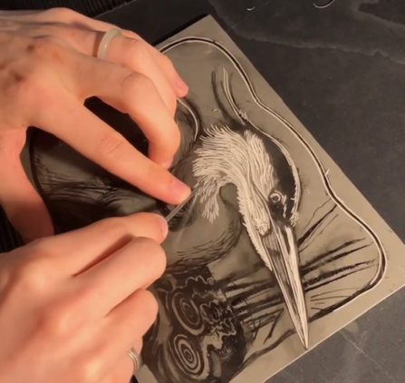 Linoprinting a heron