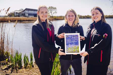 certificate presentation next to wetland nature reserve and visitor centre