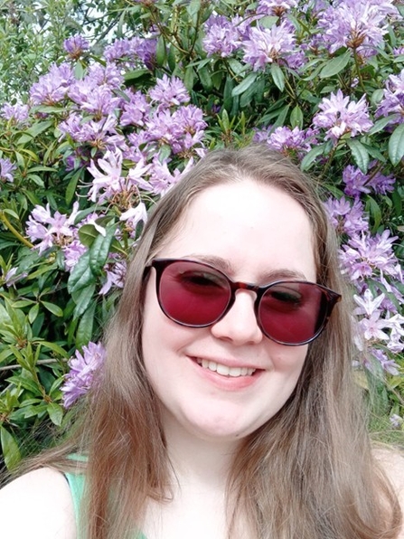 Ezme in front of flowers