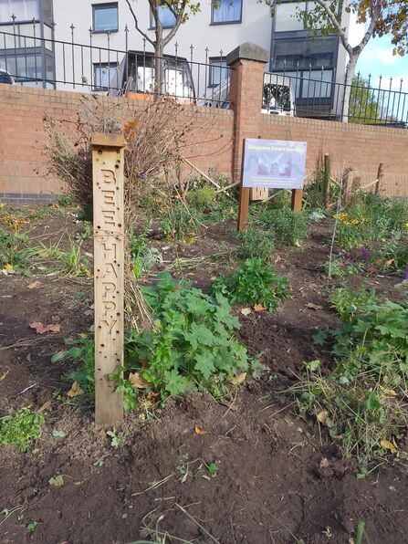 A bee post and plants